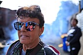 South Africa, Western Cape, Reflections in the Sunglasses of a Visitor from Langwa Township in Cape Town