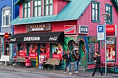 Iceland, Capital Region, Reykjavik, Man Entering a Sjopa