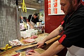 France, Indre et Loire, Loire valley listed as World Heritage by UNESCO, Tours, market hall, butcher at work