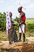 Benin, Donga department, Taneka warrior wearing traditional clothes with his wife