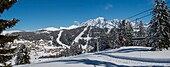 France, Savoy, Massif of Beaufortain, the resort of Col des Saisies, panoramic view of the Bisanne area, the resort and Mont Blanc massif