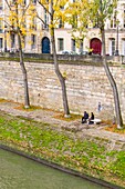 France, Paris, area listed as World Heritage by UNESCO, the banks of Seine river in autumn , Saint Louis Island