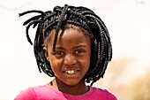 Namibia, Erongo province, Spitzkoppe, a little girl portrait