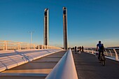 France, Gironde, Bordeaux, the Jacques Chaban Delmas lifting bridge spans the Garonne, it benefits from the last rays of the sun