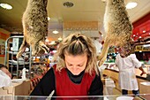 France, Indre et Loire, Loire valley listed as World Heritage by UNESCO, Tours, market hall, saleswoman in butchery and rabbits