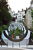 France, Loir et Cher, Loire Valley listed as World Heritage by UNESCO, Blois, Denis Papin staircases adorned with a dress in homage to the twenty years of the House of Magic