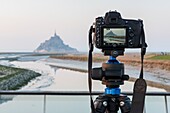 France, Manche, Mont Saint Michel Bay listed as World Heritage by UNESCO, Abbey of Mont Saint Michel and River Couesnon, camera