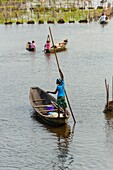 Benin, lakeside city of Ganvié, inhabitants travelling by boat downtown