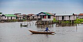 Benin, lakeside city of Ganvié, inhabitants travelling by boat downtown