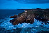 France, Finistere, Bay of Douarnenez, Cap Sizun, Pointe du Millier, The Millier lighthouse at dusk, Great National Location (aerial view)