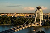 Slovakia, Bratislava, bridge Novy Most (and its panoramic tower) spans the Danube built under the communist era