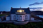 France, Finistere, Bay of Douarnenez, Cap Sizun, Pointe du Millier, The Millier lighthouse at dusk, Great National Location (aerial view)