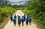 Papua New Guinea, Southern Highlands Province, Lake Kutubu, kids getting back to school