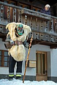 Switzerland, Valais, Lotschental valley, Wiler, Tschaggatta Carnival, costumes are made from animal skins, wooden masks and horse hair