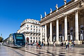 France, Gironde, Bordeaux, area classified as World Heritage by UNESCO, the Golden Triangle, Quinconces district, Place de la Comédie, TBM network tram in front of the Grand-Théâtre, built by architect Victor Louis from 1773 to 178