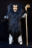 Switzerland, Valais, Lotschental valley, Wiler, Tschaggatta Carnival, costumes are made from animal skins, wooden masks and horse hair