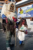 Switzerland, Valais, Lotschental valley, Wiler, Tschaggatta Carnival, costumes are made from animal skins, wooden masks and horse hair