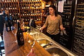 France, Indre et Loire, Loire valley listed as World Heritage by UNESCO, Tours, wine bar, at the counter, O lieu dit vin