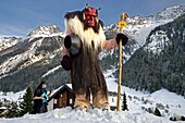 Switzerland, Valais, Lotschental valley, Wiler, Tschaggatta Carnival, costumes are made from animal skins, wooden masks and horse hair