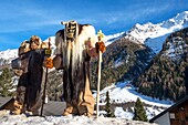 Switzerland, Valais, Lotschental valley, Wiler, Tschaggatta Carnival, costumes are made from animal skins, wooden masks and horse hair