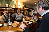 France, Indre et Loire, Loire valley listed as World Heritage by UNESCO, Tours, wine bar, man at the counter, le p'tit blanc