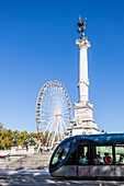 France, Gironde, Bordeaux, area classified as World Heritage by UNESCO, place des Quinconces, monument to the Girondins, also called column of the Girondins, Ferris wheel of the Autumn Pleasure Fair