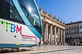 France, Gironde, Bordeaux, area classified as World Heritage by UNESCO, the Golden Triangle, Quinconces district, Place de la Comédie, TBM network tram in front of the Grand-Théâtre, built by architect Victor Louis from 1773 to 178