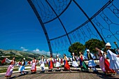 Albania, Gjirokastër, listed as World Heritage by UNESCO, folk troupe rehearsing a traditional dance on the upper terrace of the medieval fortress