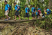 Papua New Guinea, Southern Highlands Province, Lake Kutubu, people are carring UNICEF Family Hygiene and Dignity kits