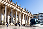 France, Gironde, Bordeaux, area classified as World Heritage by UNESCO, the Golden Triangle, Quinconces district, Place de la Comédie, TBM network tram in front of the Grand-Théâtre, built by architect Victor Louis from 1773 to 178