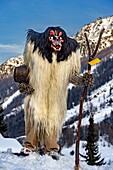 Switzerland, Valais, Lotschental valley, Wiler, Tschaggatta Carnival, costumes are made from animal skins, wooden masks and horse hair