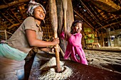 India, Arunachal Pradesh, Wakka, village of the Wancho naga tribe, pounding of the corn