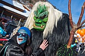 Switzerland, Valais, Lotschental valley, Wiler, Tschaggatta Carnival, costumes are made from animal skins, wooden masks and horse hair