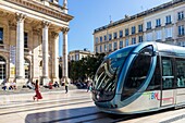 France, Gironde, Bordeaux, area classified as World Heritage by UNESCO, the Golden Triangle, Quinconces district, Place de la Comédie, TBM network tram in front of the Grand-Théâtre, built by architect Victor Louis from 1773 to 178