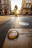 France, Gironde, Bordeaux, area listed as World Heritage by UNESCO, Saint-Pierre district, under the Porte Cailhau or Porte du Palais, nameplate of the Way of Saint-Jacques-de-Compostelle