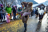 Switzerland, Valais, Lotschental valley, Wiler, Tschaggatta Carnival, costumes are made from animal skins, wooden masks and horse hair