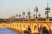 France, Gironde, Bordeaux, area listed as World Heritage by UNESCO, the Pont de Pierre over the Garonne, brick and stone vaulted bridge inaugurated in 1822