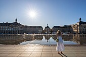 France, Gironde, Bordeaux, area classified as World Heritage by UNESCO, Saint-Pierre district, Place de la Bourse, the reflecting pool dating from 2006 and made by the fountain maker Jean-Max Llorca