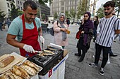 Turkey, Istanbul, Karakoy area, selling grilled fish