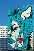 France, Paris, street art, mural called Turncoat by DFace on the facade of an apartment building in Boulevard Vincent Auriol