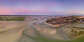 France, Somme, Baie de Somme, Le Crotoy, Sunrise over the Crotoy and the Baie de Somme at low tide (aerial view)