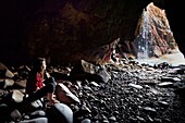 United Kingdom, Channel Islands, Jersey, parish of Saint Ouen, Plemont bay, Greve au Lanchon cave only accessible at low tide