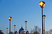 France, Paris, orthodox cathedral of the Holly Trinity in Quai Branly, street lamps on Iena bridge and the Eiffel tower in the background