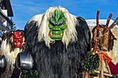 Switzerland, Valais, Lotschental valley, Wiler, Tschaggatta Carnival, costumes are made from animal skins, wooden masks and horse hair