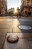 France, Gironde, Bordeaux, area listed as World Heritage by UNESCO, Saint-Pierre district, under the Porte Cailhau or Porte du Palais, nameplate of the Way of Saint-Jacques-de-Compostelle