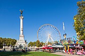 France, Gironde, Bordeaux, area classified as World Heritage by UNESCO, place des Quinconces, monument to the Girondins, also called column of the Girondins, Ferris wheel of the Autumn Pleasure Fair