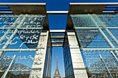 France, Paris, area listed as World Heritage by UNESCO, the Mur pour la Paix (Wall for peace) by artist Clara Halter and architect Jean Michel Wilmotte on the Champ de Mars plaza and the Eiffel tower