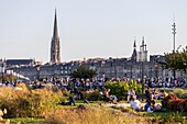 France, Gironde, Bordeaux, area listed as World Heritage by UNESCO, Bordeaux, Quai Louis XVIII, in the background the spire of the Saint-Michel Basilica in Bordeaux