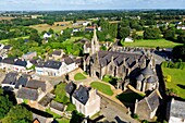 France, Finistere, Guimiliau, parish enclosure, the church, the calvary and the ossuary (aerial view)