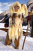 Switzerland, Valais, Lotschental valley, Wiler, Tschaggatta Carnival, costumes are made from animal skins, wooden masks and horse hair